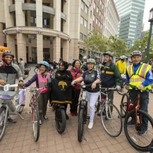 A happy and diverse group of cyclists