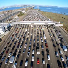 Aerial View of a Bay Bridge automatic toll gateway with several lanes of traffic flowing through it