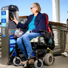 woman in a wheelchair on a ferry