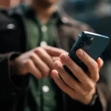 person looking at their cell phone