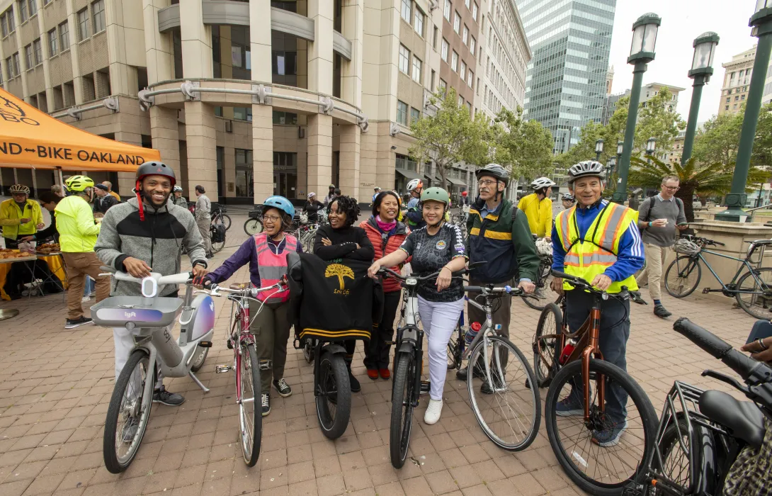 A happy and diverse group of cyclists
