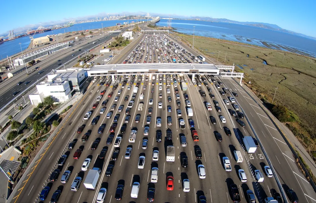 Aerial View of a Bay Bridge automatic toll gateway with several lanes of traffic flowing through it