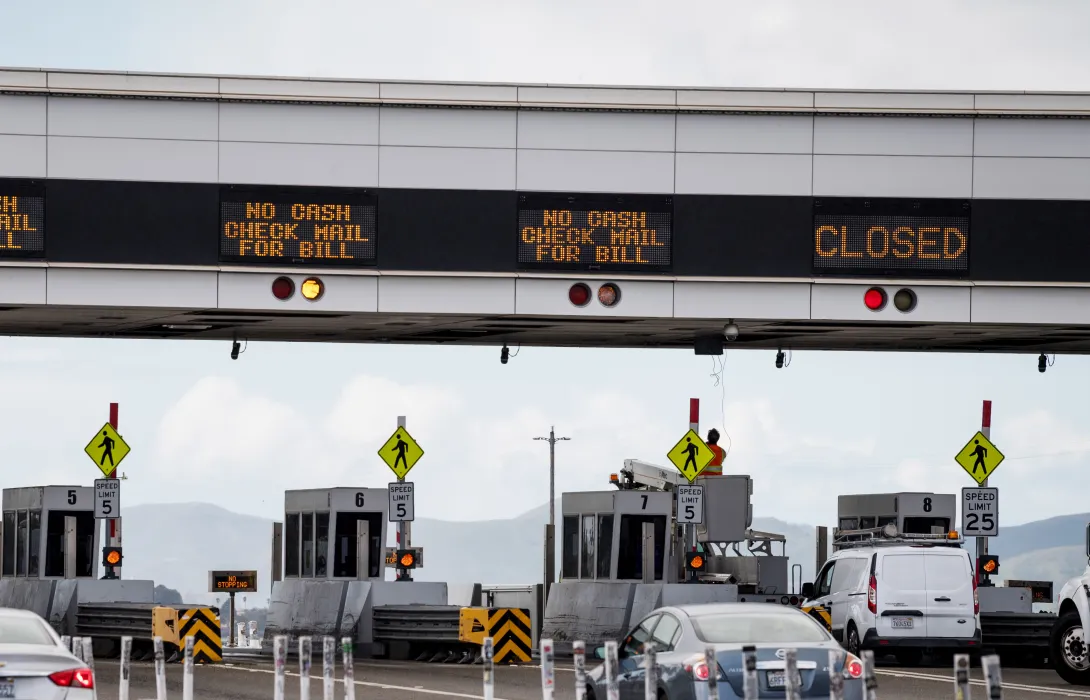 Toll lanes with information displays above them.