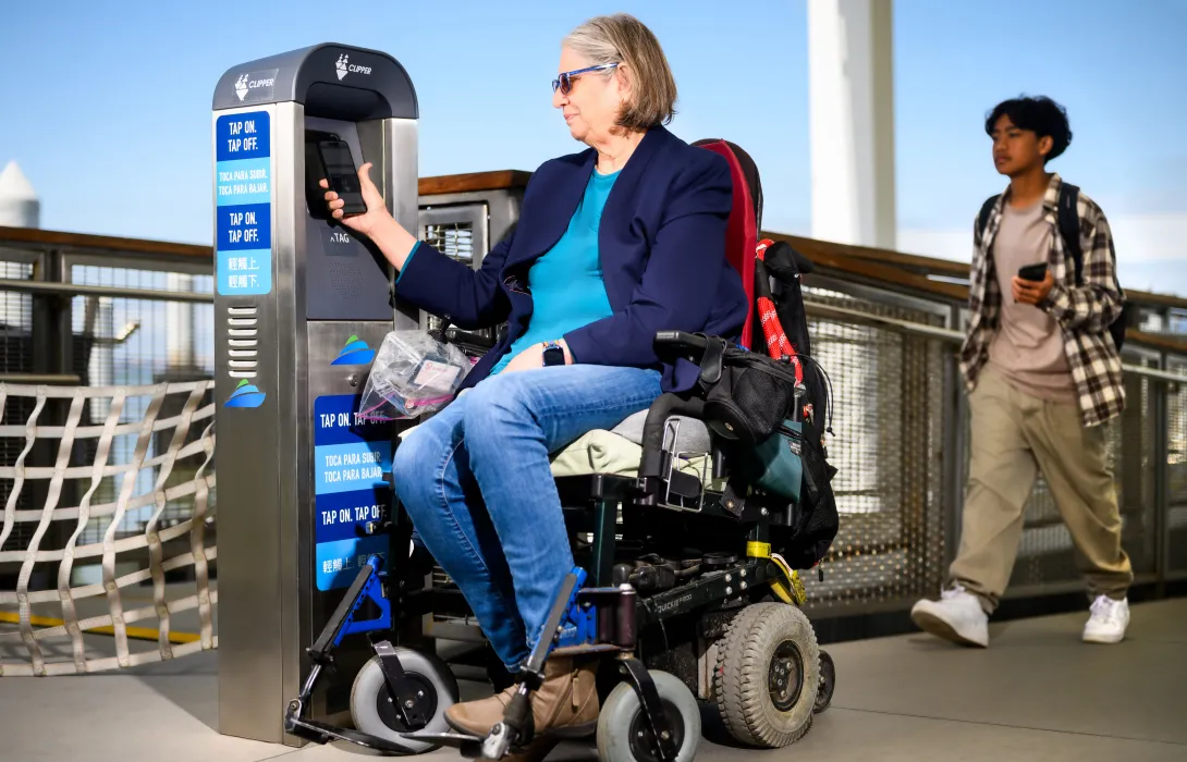 woman in a wheelchair on a ferry